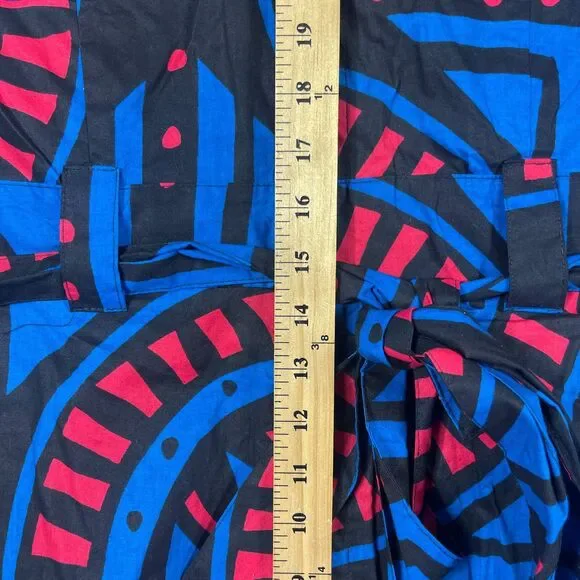 Vibrant Geometric Jumpsuit in Blue and Red - Picture 13 of 16